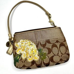Authentic Coach gold and brown wristlet